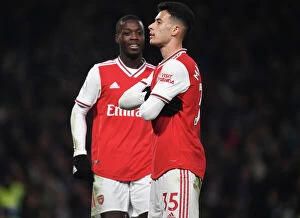 Images Dated 21st January 2020: Martinelli and Pepe Celebrate First Arsenal Goal Against Chelsea (2019-20)