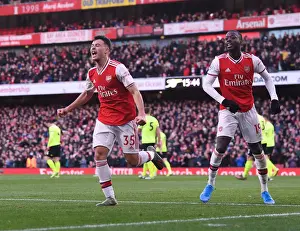 Martinelli and Pepe Celebrate Goal: Arsenal's Win Against Sheffield United (2019-20)