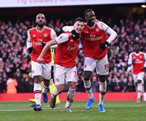 Martinelli and Pepe's Jubilant Moment: Arsenal's Thrilling Victory over Sheffield United (2019-20)