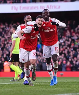 Martinelli and Pepe's Jubilant Moment: Arsenal's Thrilling Victory over Sheffield United (2019-20)