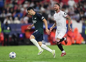 Images Dated 25th October 2023: Martinelli Scores First: Arsenal Triumphs Over Sevilla in Champions League Showdown (2023-24)