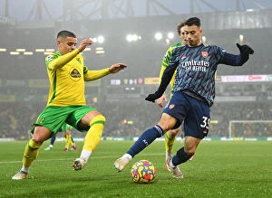 Images Dated 26th December 2021: Martinelli vs Aarons: Intense Battle at Carrow Road - Norwich City vs Arsenal