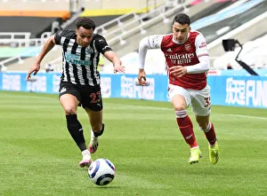 Martinelli vs. Murphy: A Premier League Battle at Empty St. James Park - Arsenal vs. Newcastle United, 2021