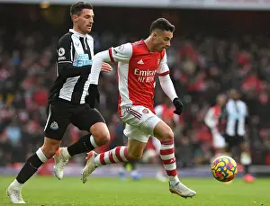 Arsenal V Newcastle United 2021-22 Prints: Martinelli vs. Schar: A Fierce Battle in Arsenal's Premier League Clash Against Newcastle