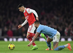 Images Dated 16th February 2023: Martinelli vs. Walker: A Battle of Wits in Arsenal's Bid to Outsmart Manchester City