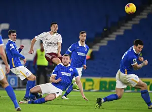 Brighton And Hove Albion V Arsenal 2020-21 Prints: Martinelli vs. Webster: A Tense Face-Off in Arsenal's Battle against Brighton