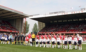 The mascots line up with Arsenal