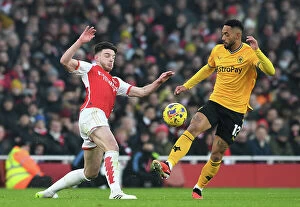 Arsenal v Wolverhampton Wanderers 2023-24 Collection: Matheus Cunha vs. Declan Rice: A Premier League Battle - Arsenal vs