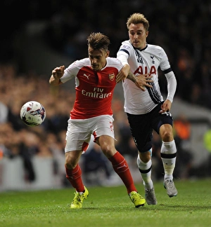 Tottenham Hotspur V Arsenal Capital One Cup 2015/16 Prints: Mathieu Debuchy (Arsenal) Chritian Eriksen (Tottenham). Tottenham Hotspur 1: 2 Arsenal