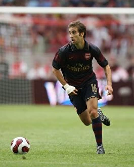 Flamini Mathieu Collection: Mathieu Flamini in Action: Arsenal's Victory over Lazio at Amsterdam ArenA (2007)