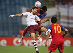 Steaua Bucharest v Arsenal 2007-08 Collection: Mathieu Flamini (Arsenal) Banel Nicolita (Steaua)