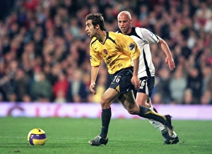 Mathieu Flamini (Arsenal) Claus Jensen (Fulham)