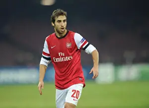 Napoli V Arsenal 2013-14 Prints: Mathieu Flamini: Arsenal's Tenacious Midfielder Shines in the 2013-14 UEFA Champions League Clash Against Napoli