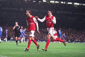 Images Dated 11th December 2006: Mathieu Flamini celebrates scoring Arsenals goal with Robin van Persie
