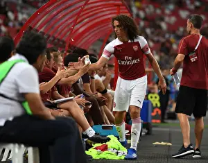 Matteo Guendouzi Bids Farewell to Arsenal Bench Amidst Atletico Madrid Clash in 2018 International Champions Cup