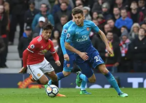 Manchester United V Arsenal 2017-18 Prints: Mavropanos vs Sanchez: Intense Battle at Old Trafford - Manchester United vs Arsenal