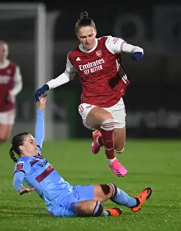Arsenal Women V West Ham United Women 2020-21 Prints: Empty Meadow Park Showdown: A Head-to-Head Battle Between Vivianne Miedema and Cecile Kvamme in the FA WSL