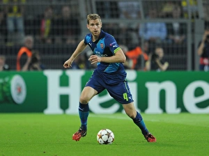 Borussia Dortmund V Arsenal 2014-15 Prints: Per Mertesacker in Action: Borussia Dortmund vs Arsenal, UEFA Champions League (2014-15)