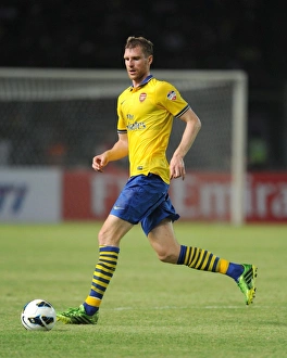 Indonesia Dream Team V Arsenal 2013-14 Prints: Per Mertesacker in Action against Indonesia All-Stars (2013)