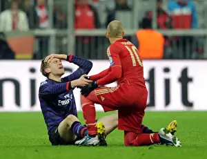 Bayern Munich V Arsenal 2012-13 Prints: Per Mertesacker and Arjen Robben