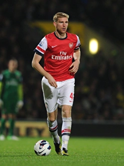 Norwich City V Arsenal 2012-13 Prints: Per Mertesacker of Arsenal in Action against Norwich City (2012-13)