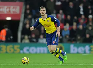 Southampton V Arsenal 2014-15 Prints: Per Mertesacker of Arsenal in Action against Southampton in the 2014-15 Premier League