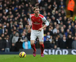 Tottenham Hotspur V Arsenal 2014-15 Prints: Per Mertesacker of Arsenal in Action Against Tottenham Hotspur - Premier League 2014-15