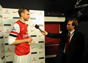 Per Mertesacker (Arsenal) is interviewed after the match by Josh James for Arsenal TV