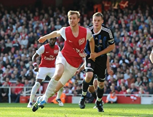 Arsenal v Stoke City 2011-2012 Gallery: Per Mertesacker (Arsenal) Ryan Shawcross (Stoke). Arsenal 3: 1 Stoke City