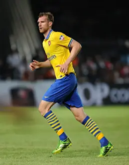 Indonesia Dream Team V Arsenal 2013-14 Prints: Per Mertesacker: Arsenal Star in Indonesia Dream Team Clash (2013-14)