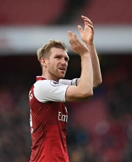 Images Dated 28th October 2017: Per Mertesacker Celebrates with Arsenal Fans after Arsenal v Swansea City Match, 2017-18