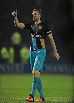 Sheffield Wednesday v Arsenal - Capital One Cup 2015-16 Collection: Per Mertesacker Celebrates with Arsenal Fans after Sheffield Wednesday Cup Victory