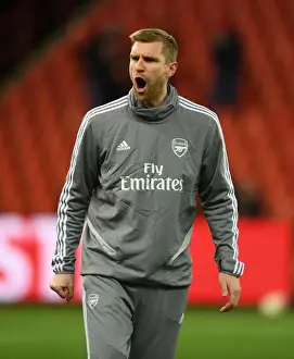 Mertesacker Coaches Arsenal in UEFA Europa League Match against Standard Liege