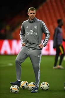 Mertesacker Coaches Arsenal in UEFA Europa League Match against Standard Liege