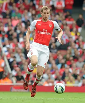 Arsenal V Manchester City 2014-15 Prints: Per Mertesacker: Focused Defence Against Manchester City - Arsenal vs