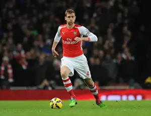 Arsenal V Southampton 2014-15 Prints: Per Mertesacker Focuses in Arsenal vs Southampton Premier League Clash (2014-15)