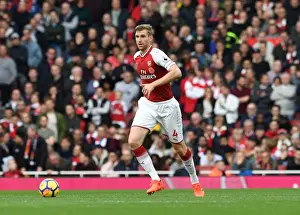 Arsenal V Swansea City 2017-18 Prints: Per Mertesacker Focuses in Arsenal's Battle Against Swansea City (2017-18)