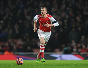 Arsenal V Hull City 2014-15 - FA Cup Prints: Per Mertesacker Focuses in FA Cup Clash: Arsenal vs. Hull City (2014-15)