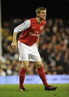 Fulham V Arsenal 2011-12 Prints: Per Mertesacker Focuses in Fulham vs Arsenal Premier League Clash (2011-12)