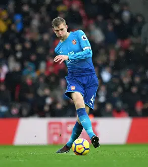 Southampton V Arsenal 2017-18 Prints: Per Mertesacker Focuses in Southampton vs Arsenal Premier League Clash (2017-18)