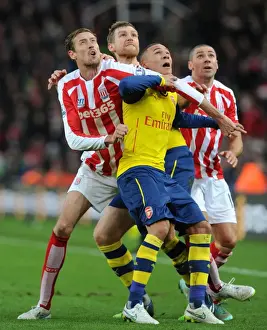Stoke City V Arsenal 2014-15 Prints: Per Mertesacker and Kieran Gibbs vs