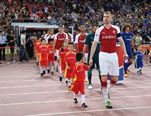 Arsenal V Chelsea - Pre Season 2017-18 Prints: Per Mertesacker Leads Arsenal Against Chelsea in 2017 Beijing Pre-Season Friendly