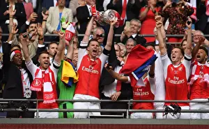 Arsenal V Chelsea - FA Cup Final 2017 Prints: Per Mertesacker Lifts FA Cup: Arsenal's Victory over Chelsea (2017)