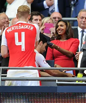 Per Mertesacker Receives Community Shield Medal from Janet Rocastle after Arsenal's Victory over Chelsea