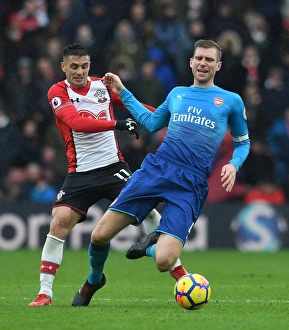 Southampton V Arsenal 2017-18 Prints: Per Mertesacker vs. Dusan Tadic: Battle at St