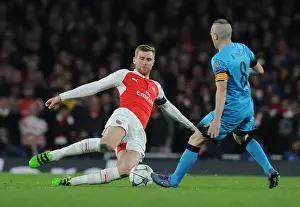 Arsenal V Barcelona 2015/16 Prints: Mertesacker vs. Iniesta: A Battle of Champions - Arsenal vs. Barcelona, 2015/16