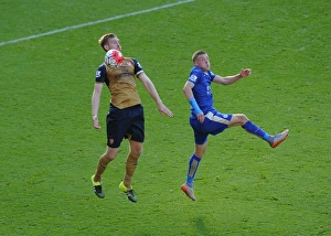 Leicester City V Arsenal 2015/16 Prints: Per Mertesacker vs Jamie Vardy