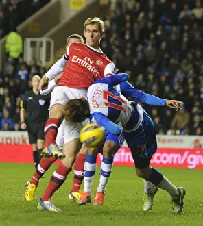 Reading V Arsenal 2012-13 Prints: Per Mertesacker vs. Kaspars Gorkss: Intense Battle in Reading v Arsenal (2012-13)
