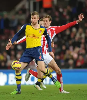 Per Mertesacker vs. Peter Crouch: A Battle at the Britannia Stadium (Stoke City vs. Arsenal, Premier League, 2014)
