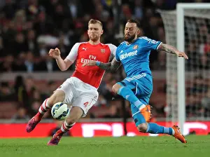 Per Mertesacker vs. Steven Fletcher: Intense Clash in Arsenal vs. Sunderland Premier League Match